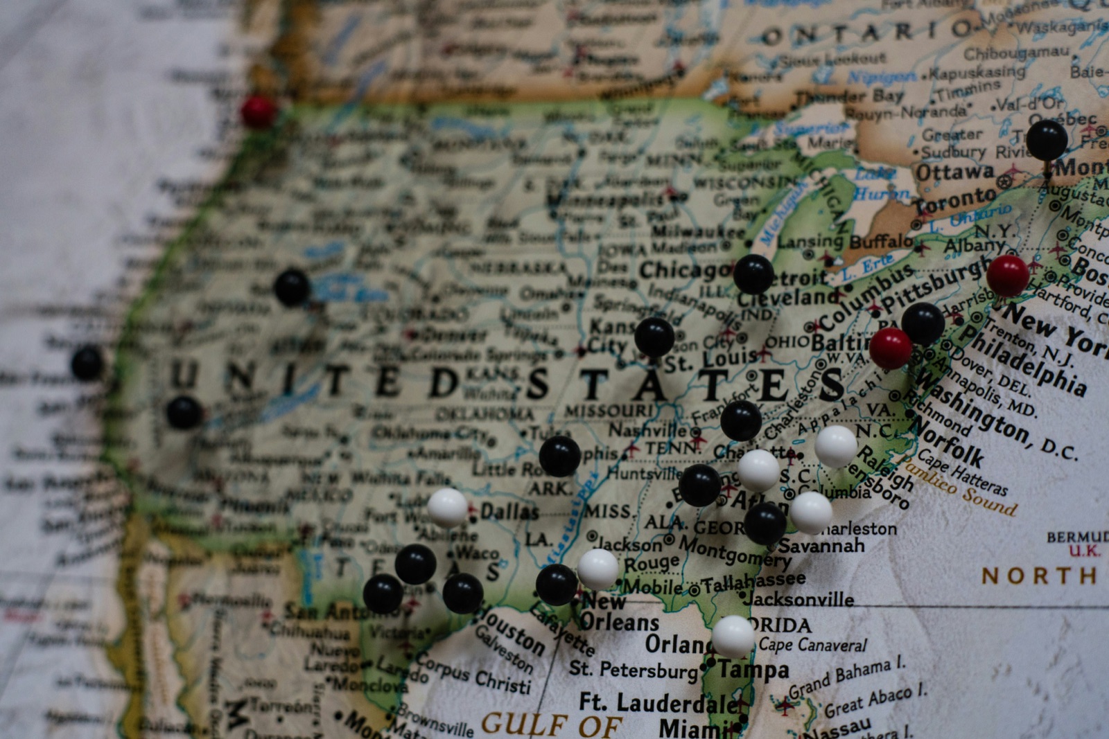 A map of the United States with pins marking multiple states